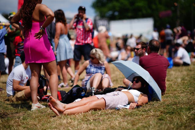 Temperatures are likely to be high throughout Glastonbury, but some rain is possible (Ben Birchall/PA)