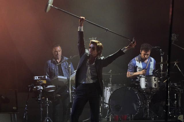 <p>Alex Turner and Arctic Monkeys on the Glastonbury main stage </p>